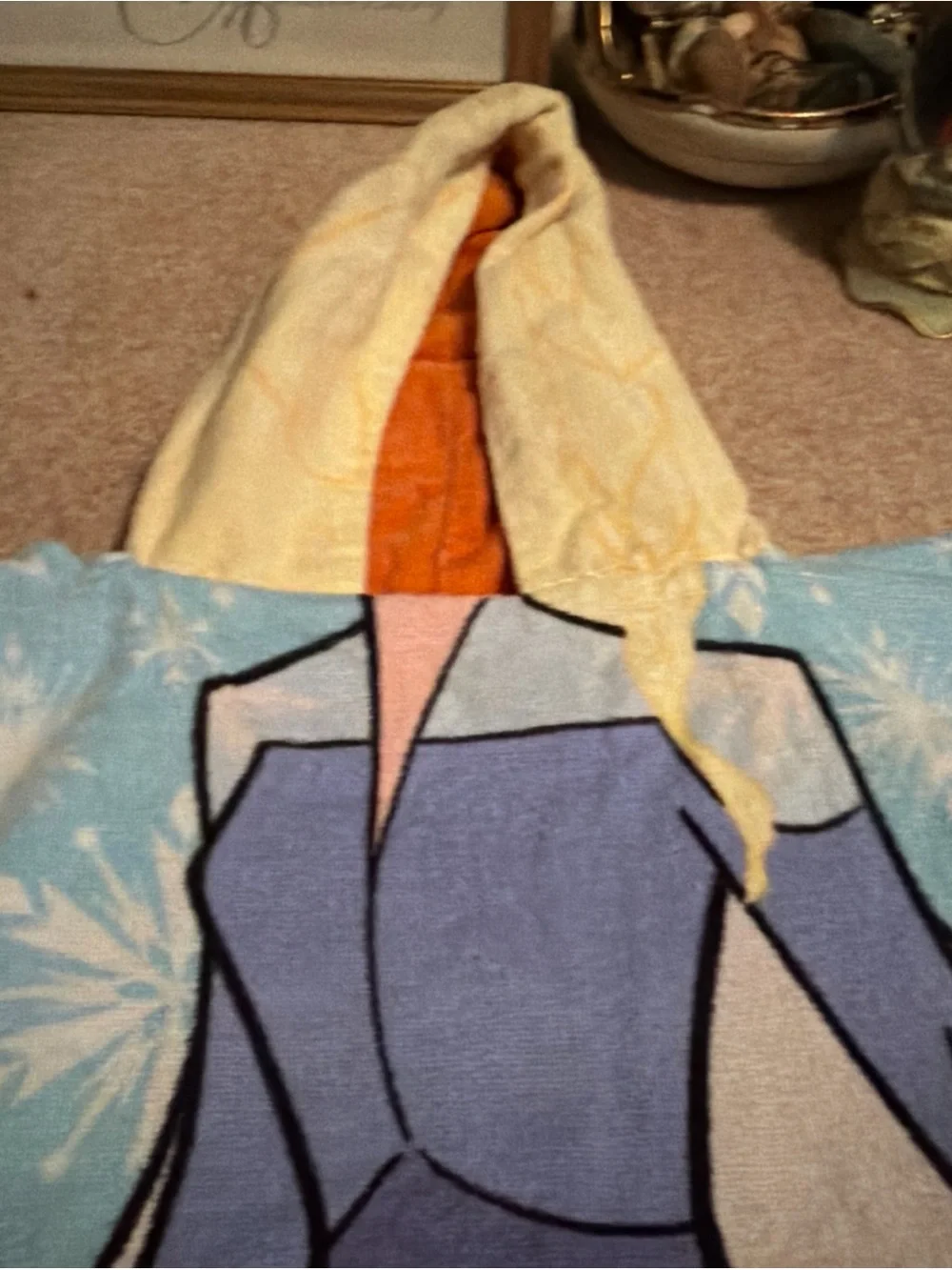 This Disney Frozen Reversible Elsa & Anna hooded poncho towel